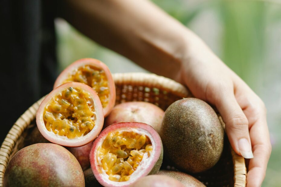 Woman With Fresh Passion Fruit In Bowl Free Stock Photo